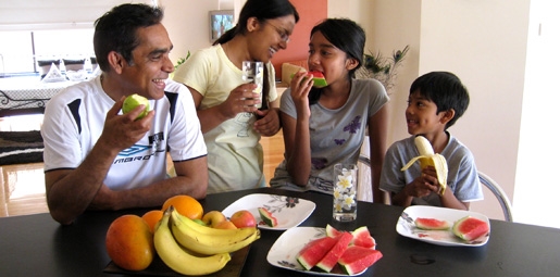  Family eating fruit